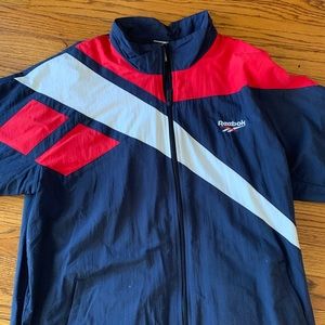 Men’s Reebok vintage style windbreaker zip up.